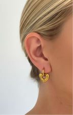 Golden Heart Huggie Earring - On Ear Clean Background